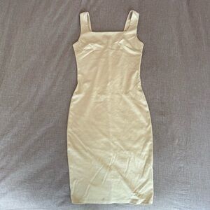 Love Culture's Elegant Cream Sleeveless Bodycon Dress